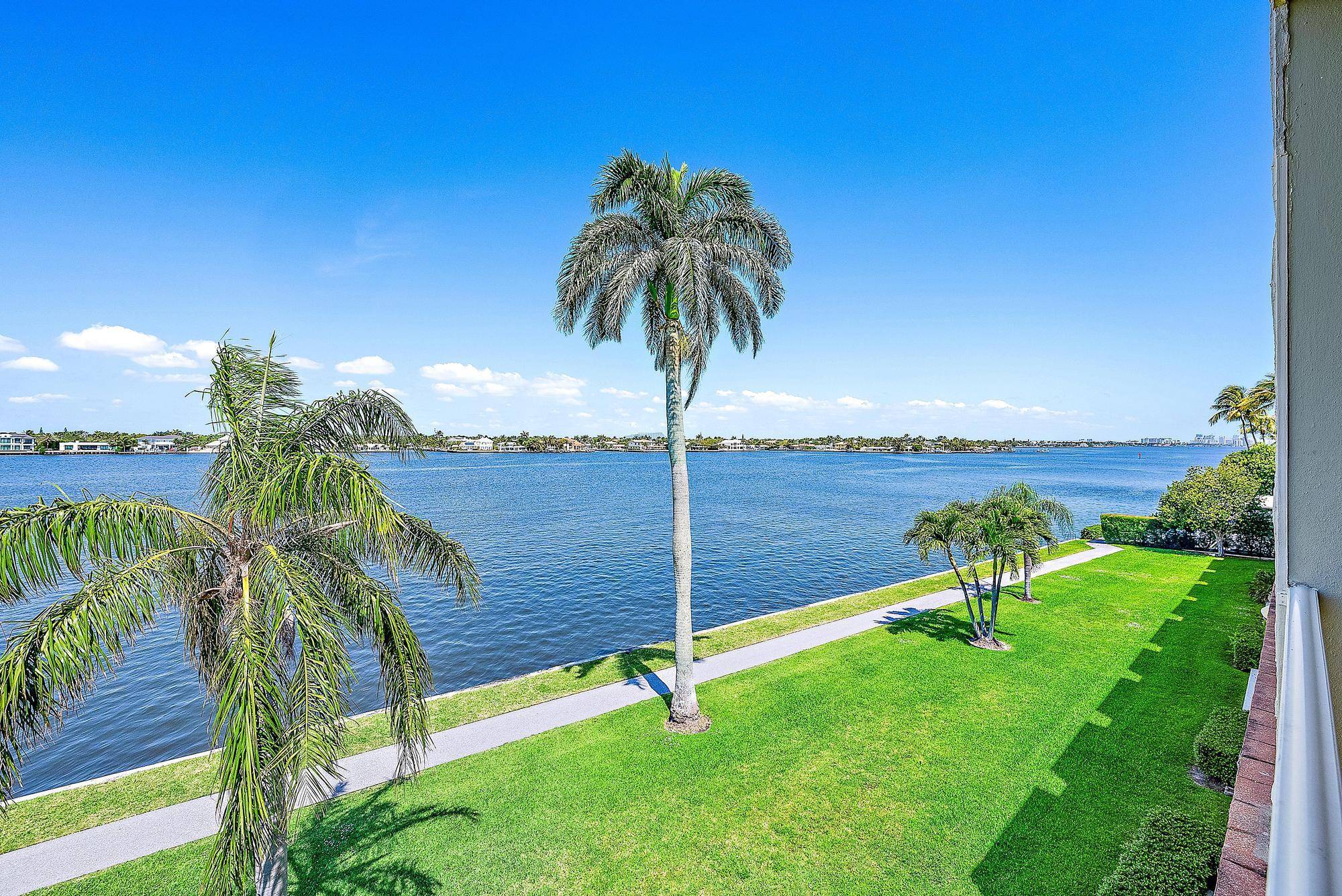 Enjoy spectacular direct Intracoastal views and stunning sunsets from this tastefully renovated Ibis Isle apartment with 9 ft ceilings and floor to ceiling sliders opening to a spacious terrace.