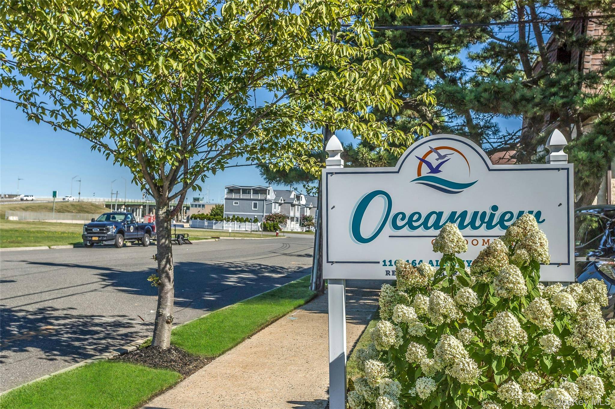 Enjoy coastal living in this charming corner two bedroom, one and a half bath condominium with private beach access.