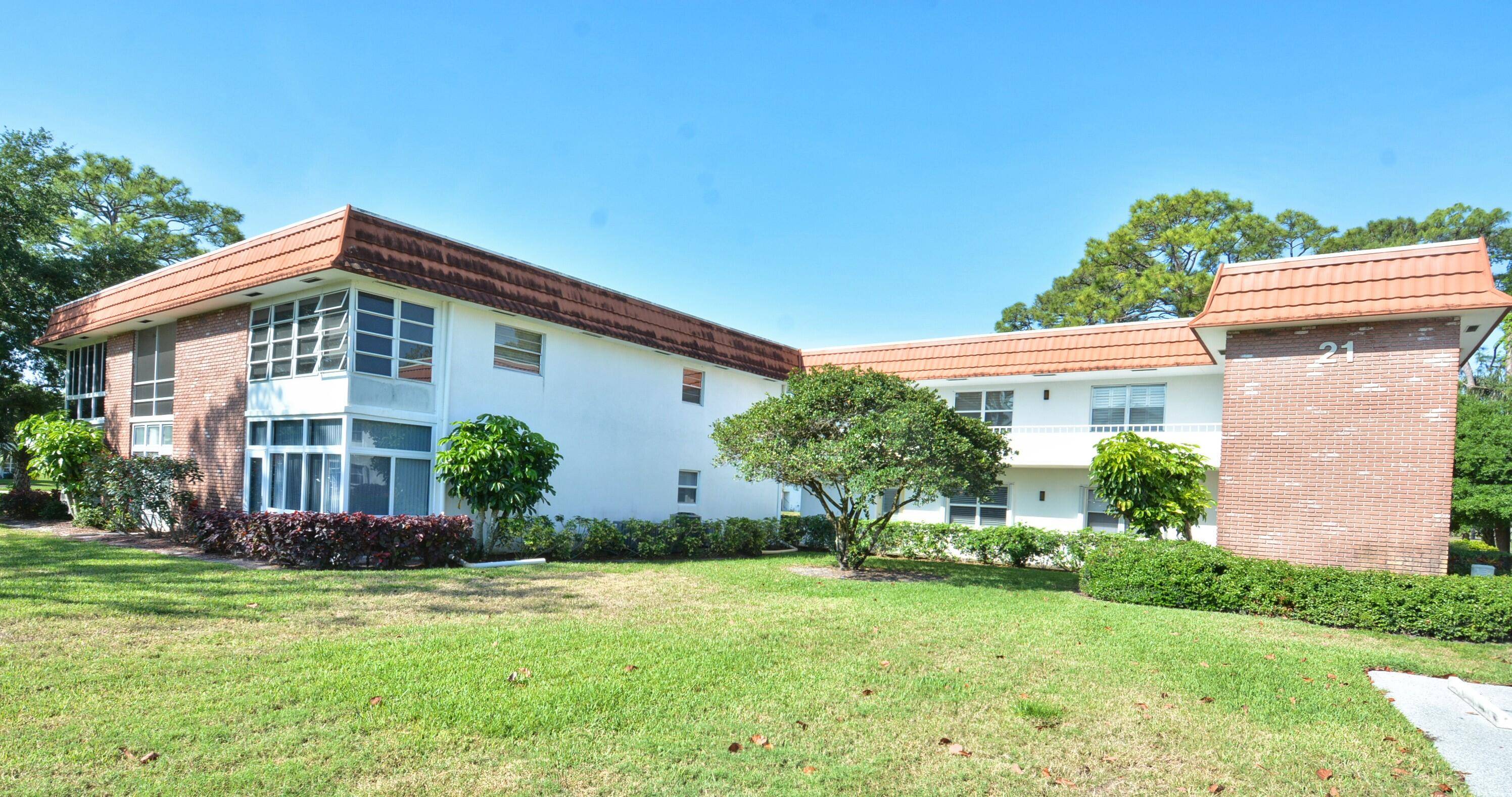 Stunningly renovated condo w front impact windows in an active 55 community.