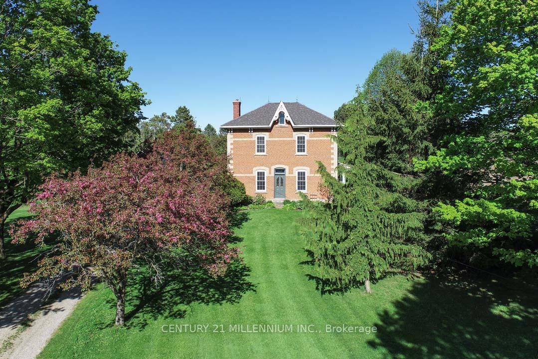 Located on a quiet rural country road, in a fantastic Southerly location, this charming 4 bedroom, red brick Century home stately sits on 4.