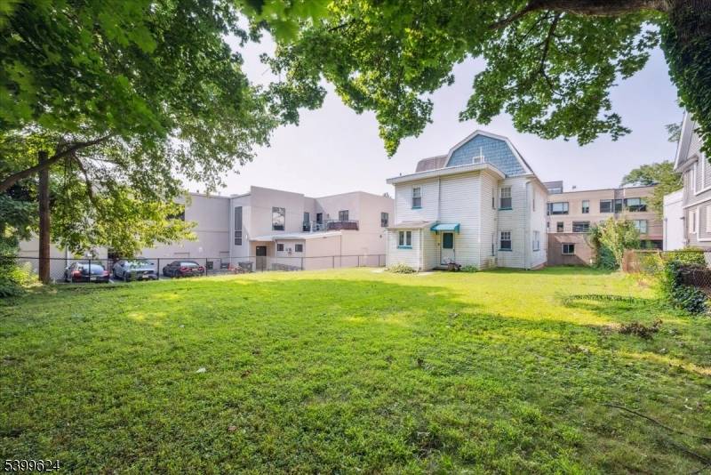 commuter's Dream ! Welcome to this inviting 4 bedroom single family home ideally situated in the heart of Maplewood Village.