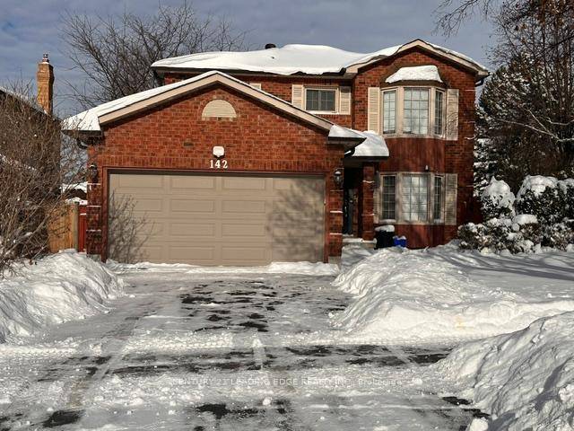 Welcome to this well maintained 4 bedroom, 3 bath detached home with a double car garage, situated on a premium corner lot in Whitby's desirable Blue Grass Meadow community.