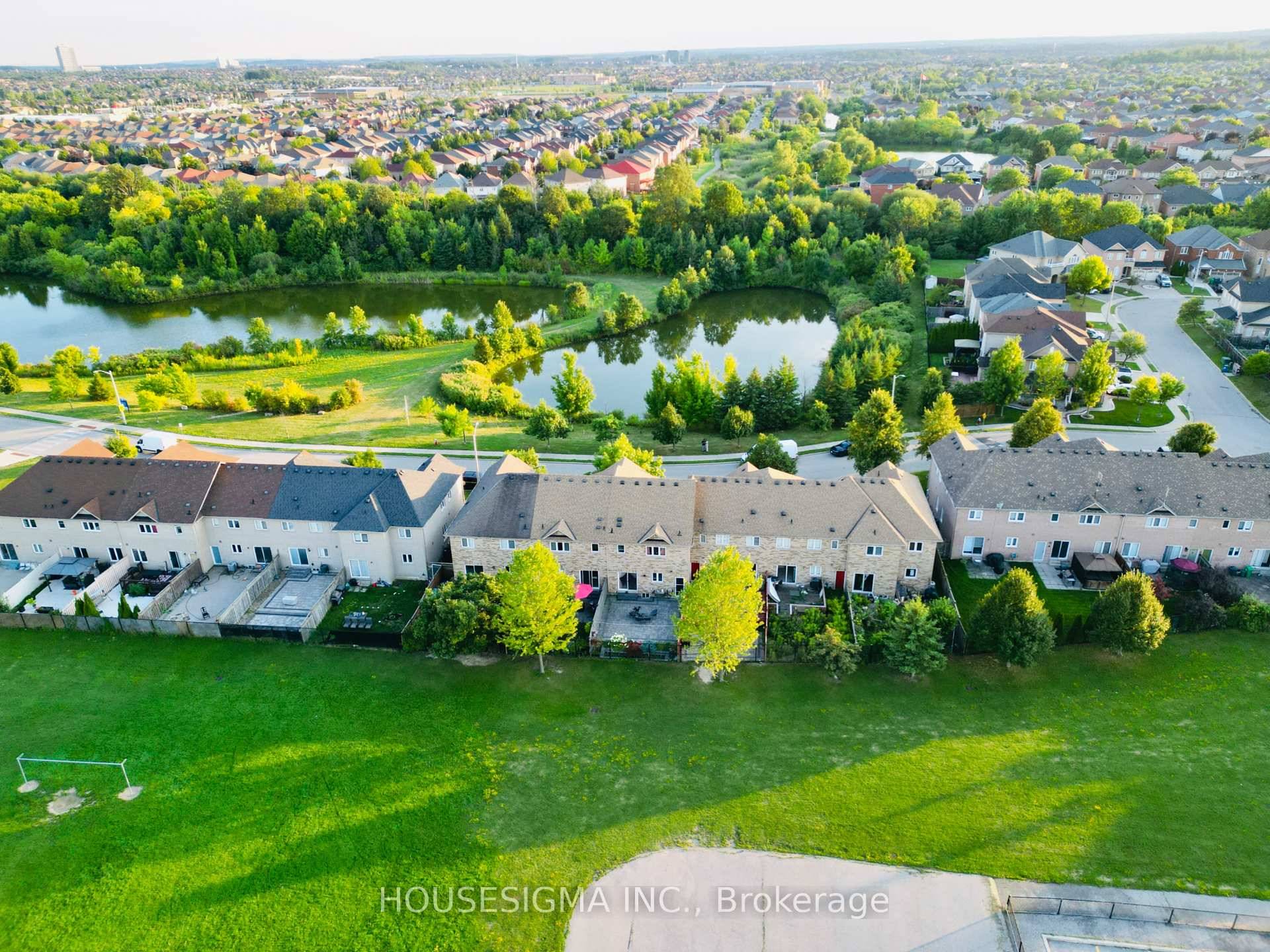 True Freehold Townhouse Private Pond Views No Neighbours Behind No Sidewalk 3 Car Parking.