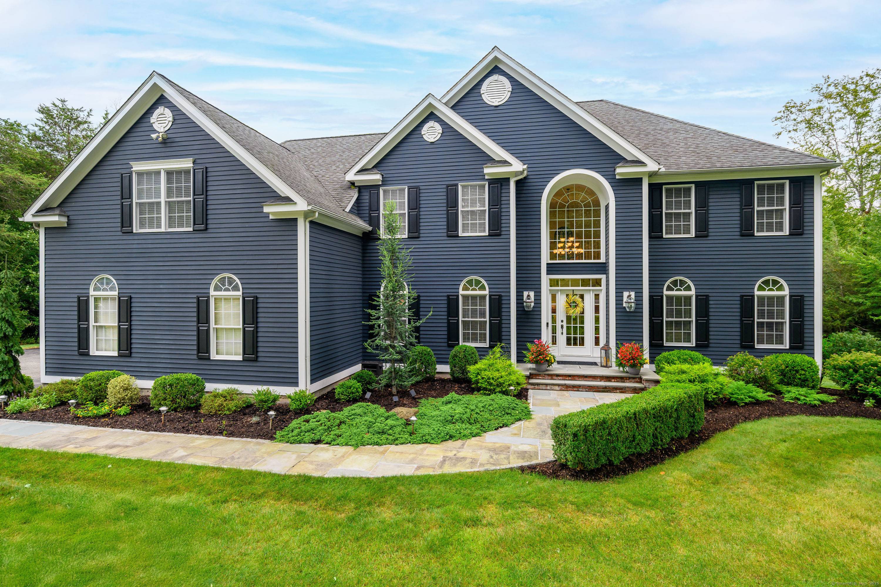 Look no further as this stunning Colonial is perfectly situated on a beautiful lot nestled on one of Newtown's most desirable cul de sacs.
