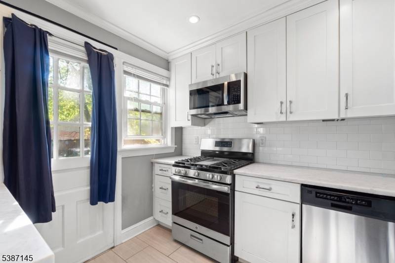 A beautifully maintained brick exterior townhouse located in the highly desirable Maplewood Village Condominiums.