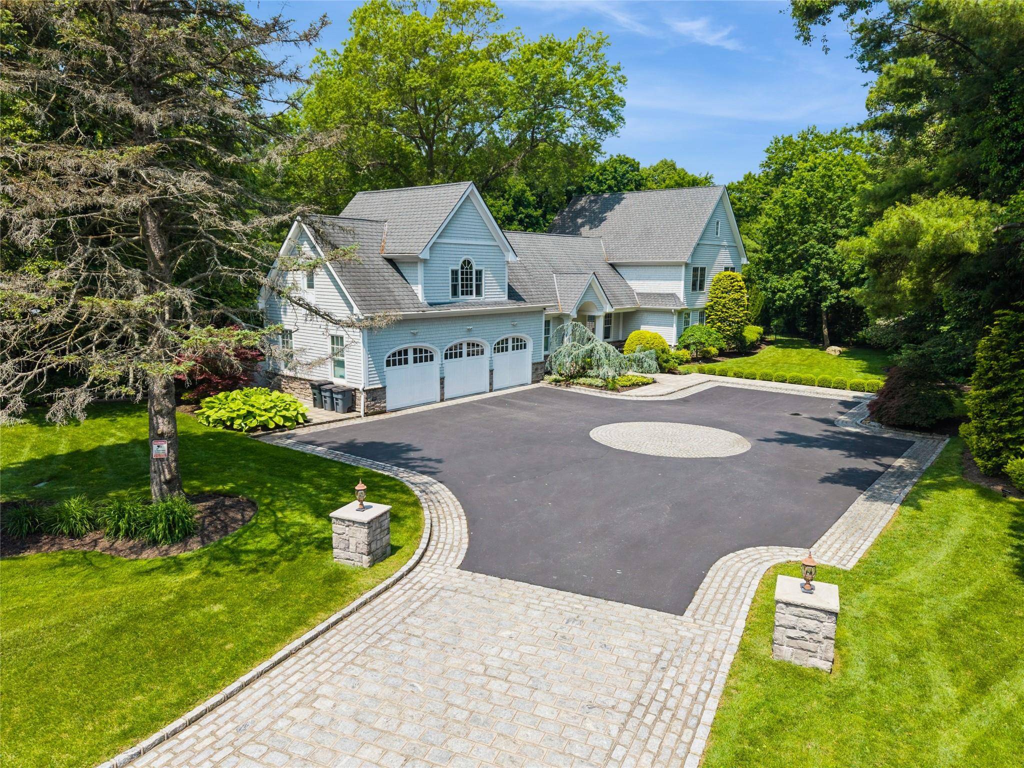 A Rare and one of a kind living experience awaits you in this Hampton Style sun drenched beauty.