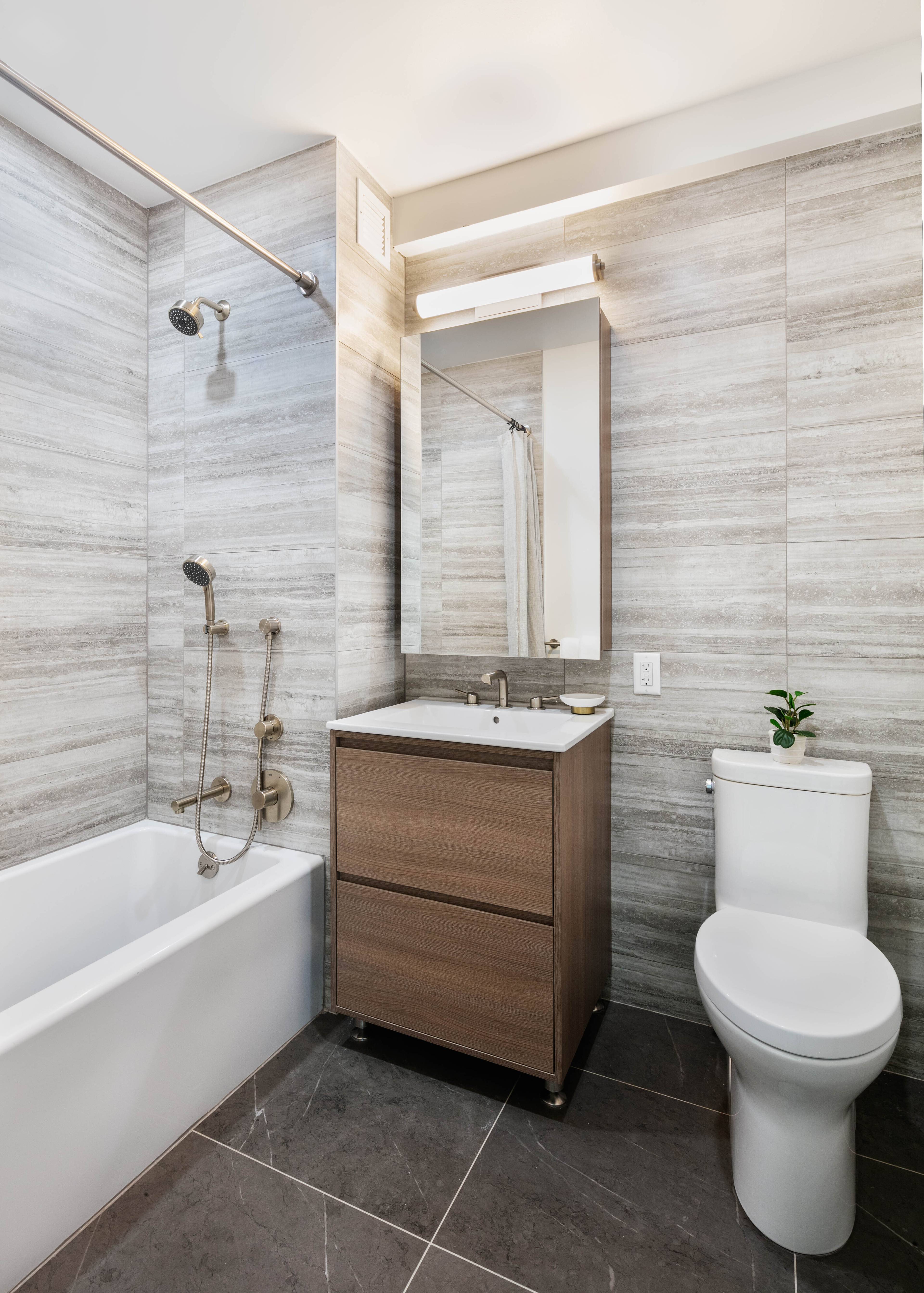 Beautiful 1 bed 1 bath apartment, oversized windows, matte black and Calcutta finishes, custom tiled bathrooms and in unit washer dryer.