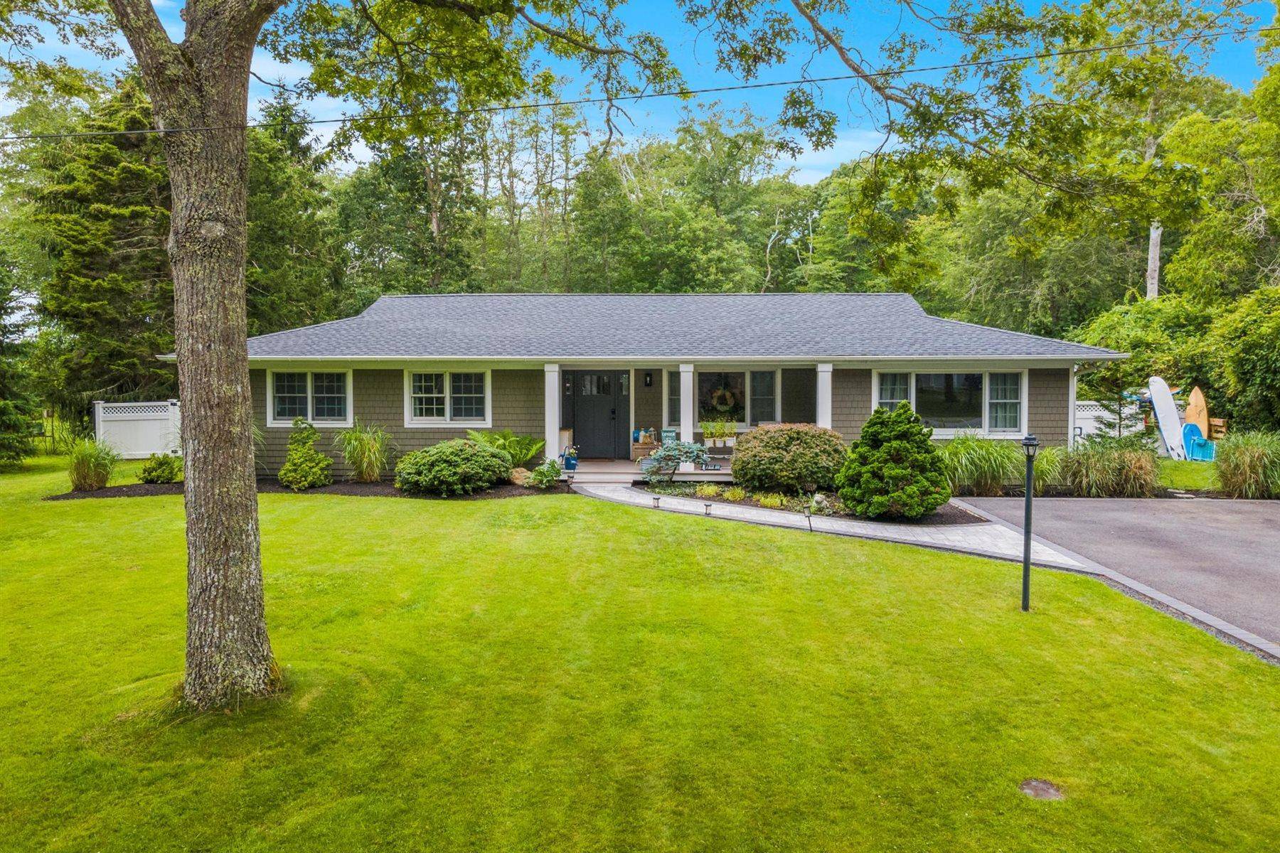 PRIVATE COMMUNITY WITH BEACH amp ; DOCKING RIGHTS Nestled behind the private gates of Pine Neck Landing, a private community in east Quogue, this beautifully maintained residence offers the perfect ...
