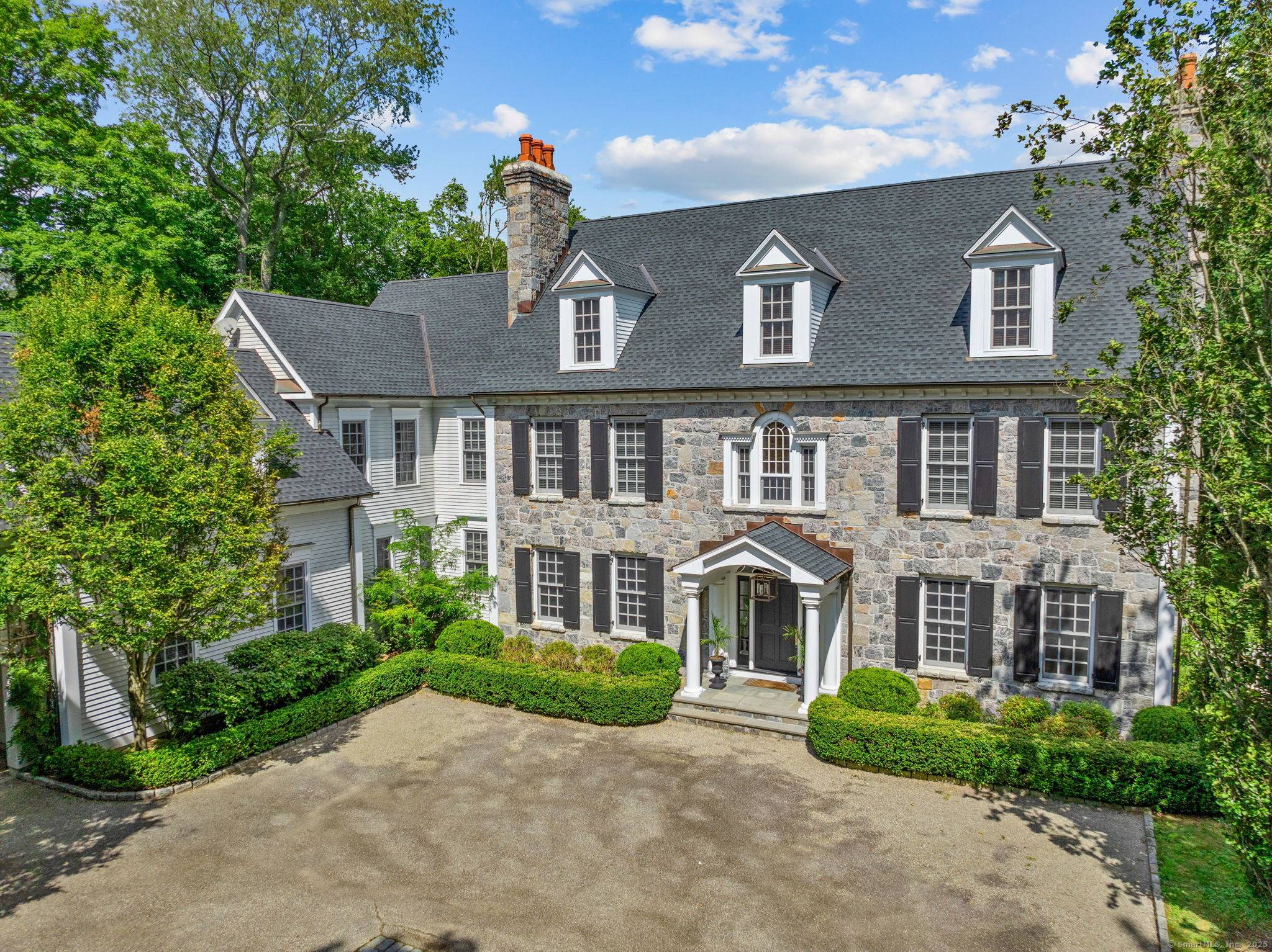 Luxurious estate available immediately Four finished floors with amazing primary suite, double story library, gracious rooms and awesome lower level including wine cellar, gym, bar and family room.