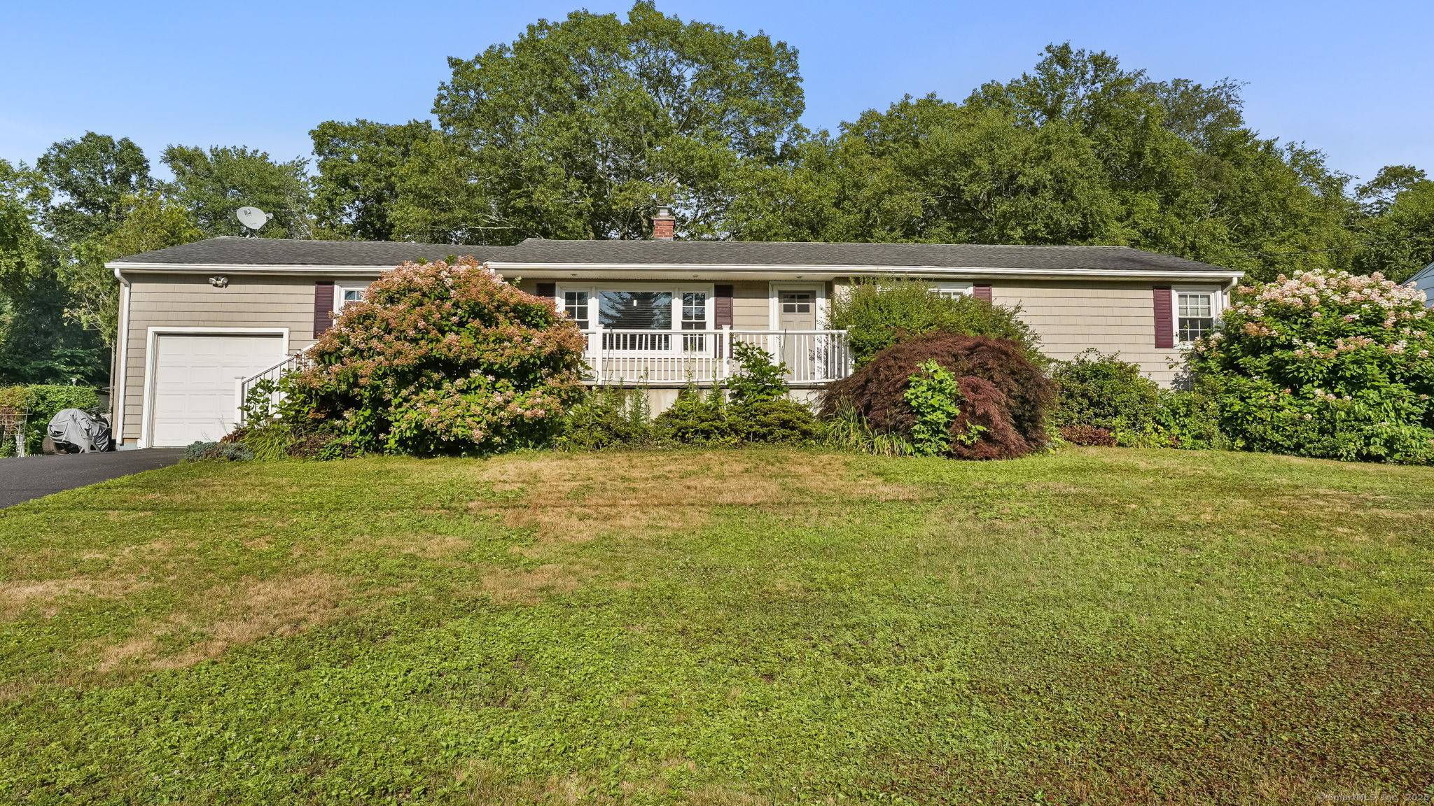 Welcome to this charming custom ranch style home offering space, versatility, and comfort on a beautiful half acre of level land.