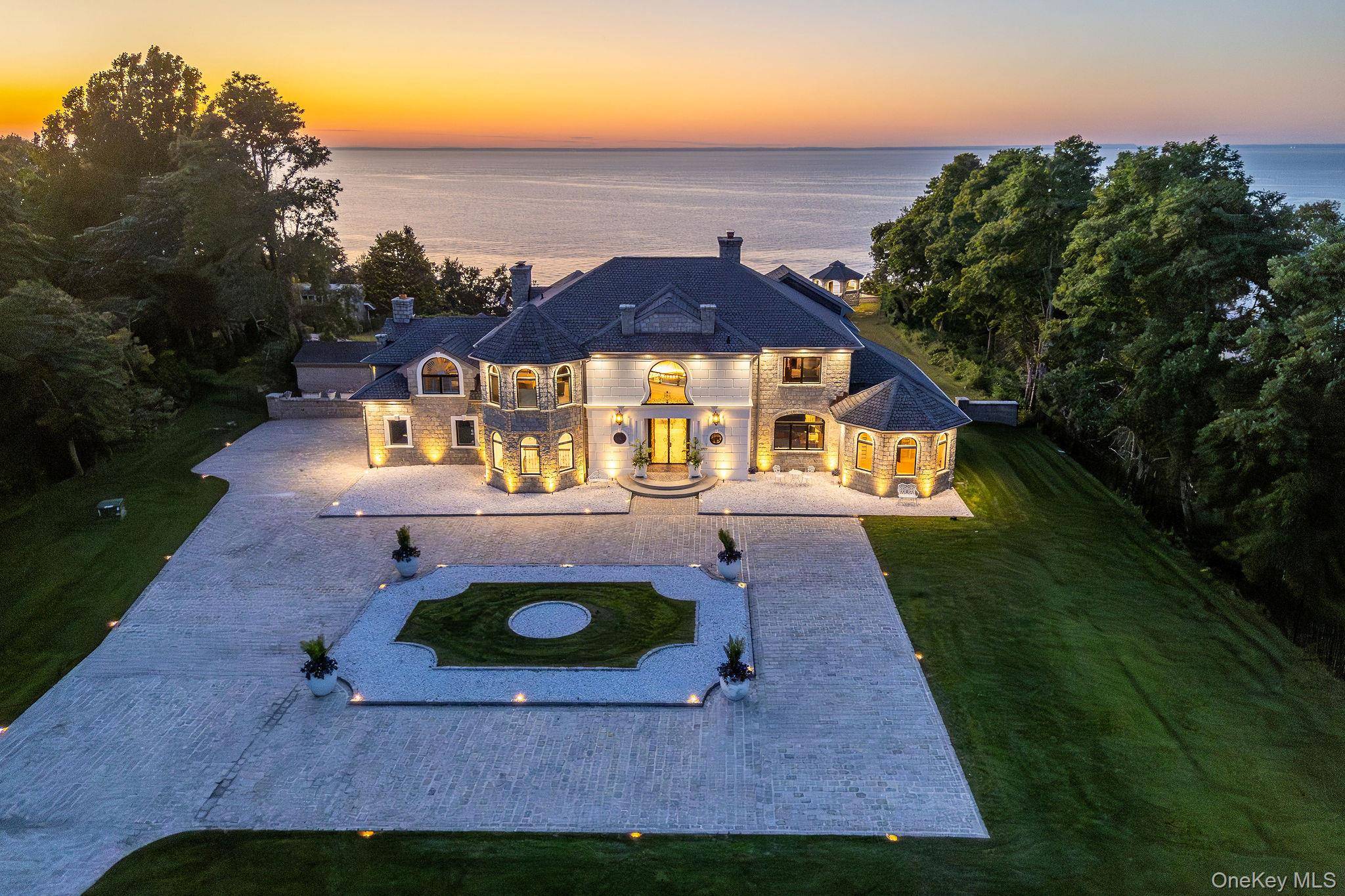 Welcome to Lion s Gate on the Sound, a premier waterfront estate set on over 3 private, gated acres along the Long Island Sound in Mattituck.