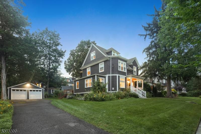 Sweeping Modern Victorian situated on a large lot in sought after neighborhood is close to everything S.
