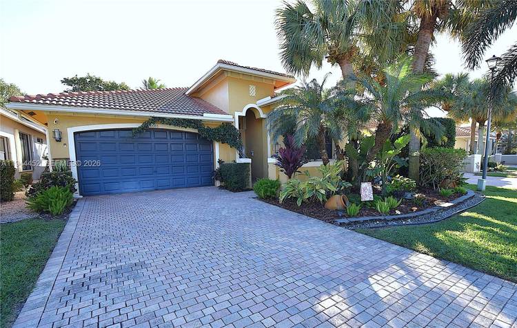 This beautifully updated 3 bedroom home in Tivoli Lakes greets you with a spacious open floor plan, a charming foyer, and lush landscaping surrounding the front, sides, and back.