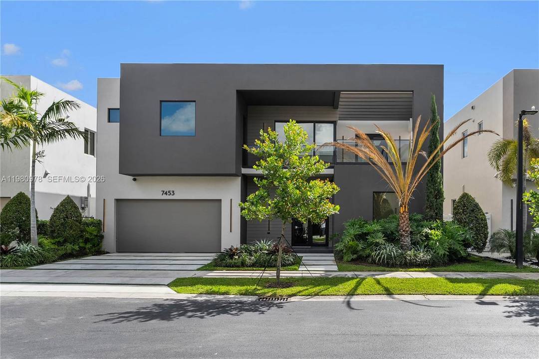 This beautiful home is in the desirable and luxurious Modern Doral 60.