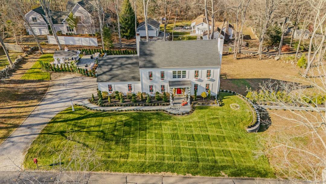 Exquisitely updated remodeled Essex home on the cusp of South Cove with easterly views.