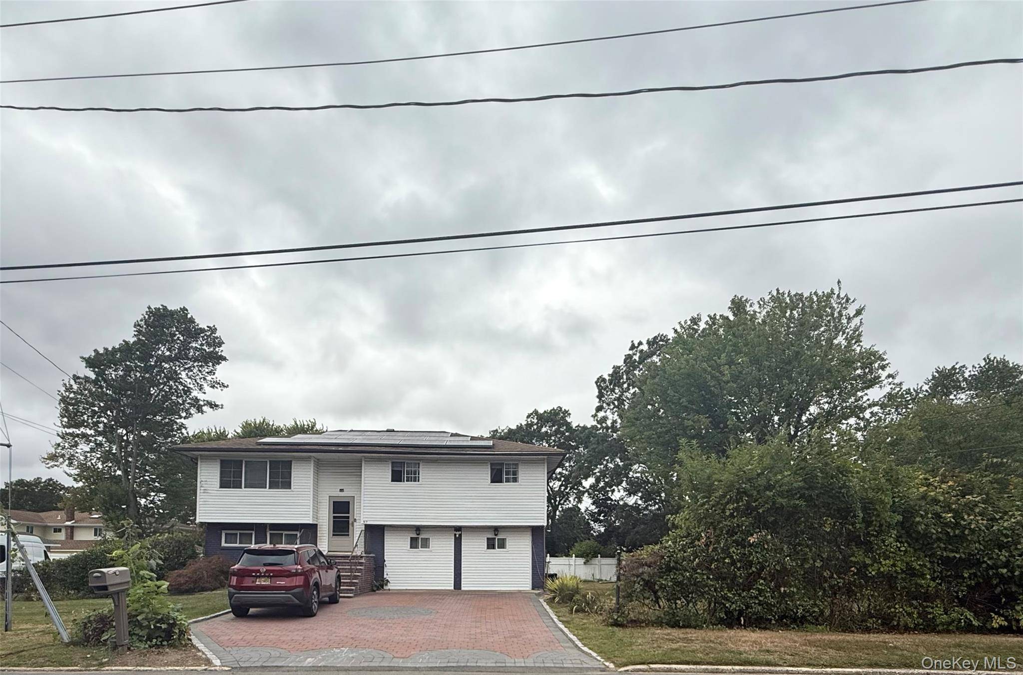 Welcome Home ! This 5 bedroom, 2 bath gem offers 2, 012 sq.