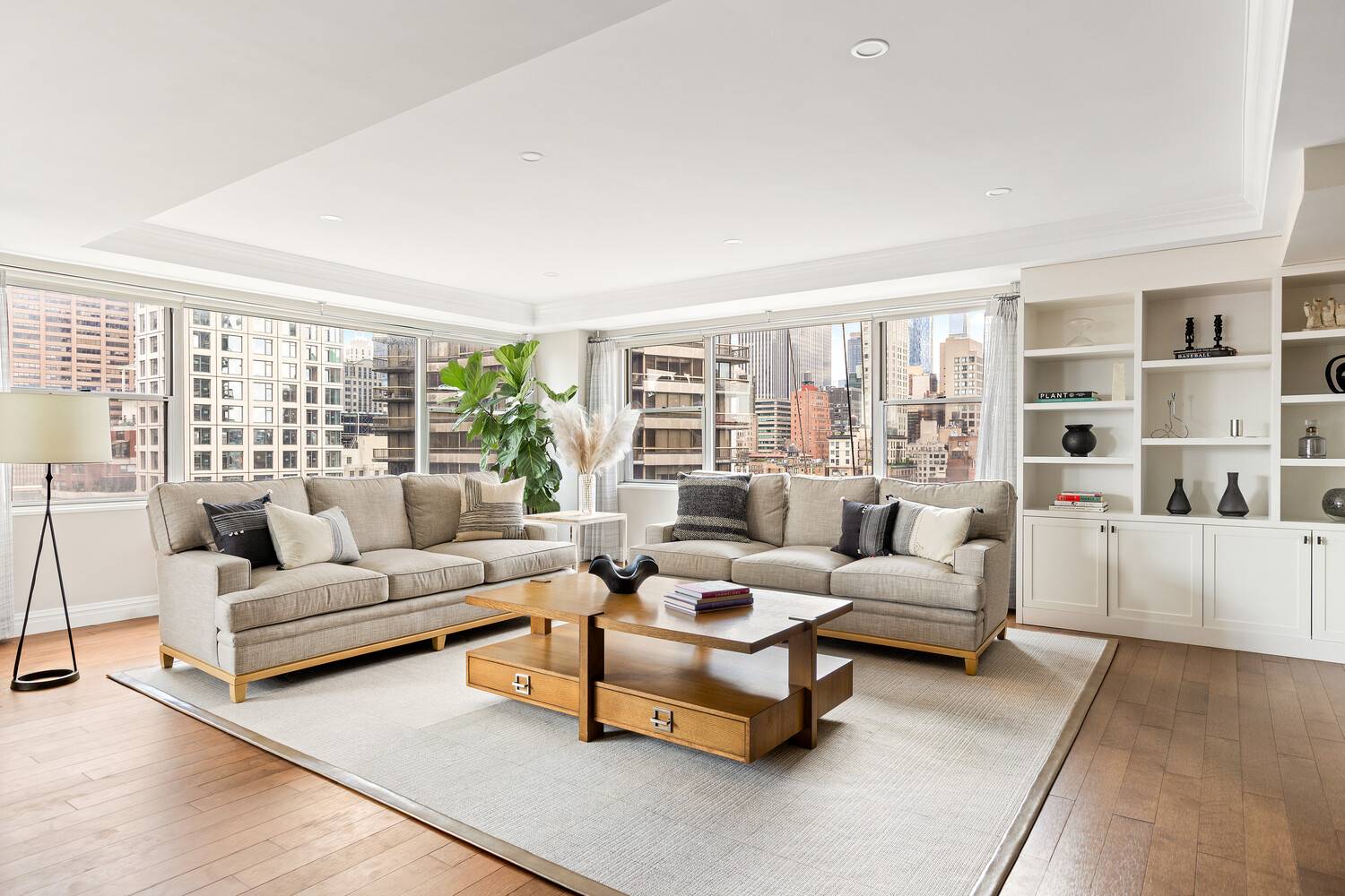Welcome to Residence 18B This sun drenched, fully renovated 2 bed, 2 bath home offers sweeping south, west, and east exposures and a rare private terrace with panoramic city views.