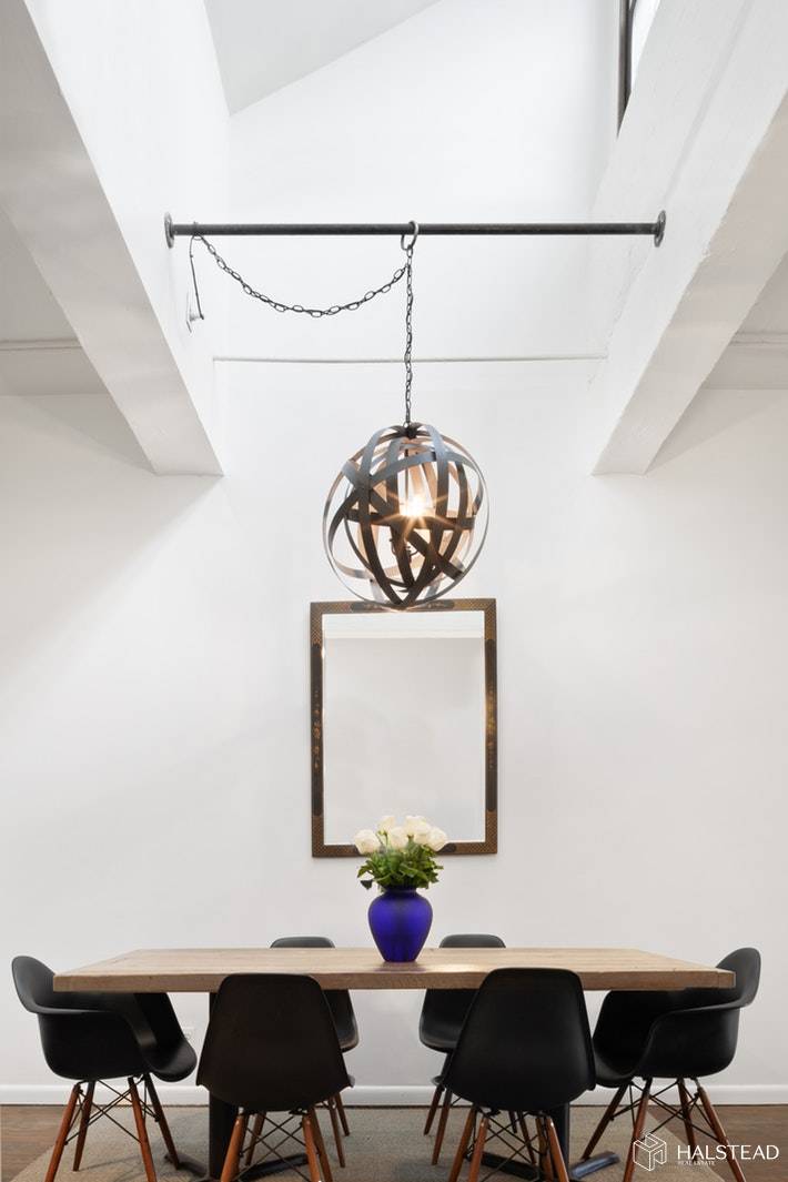 Welcome home to this gorgeous top floor, converted two bedroom apartment in the coveted Ansonia Storage Warehouse.