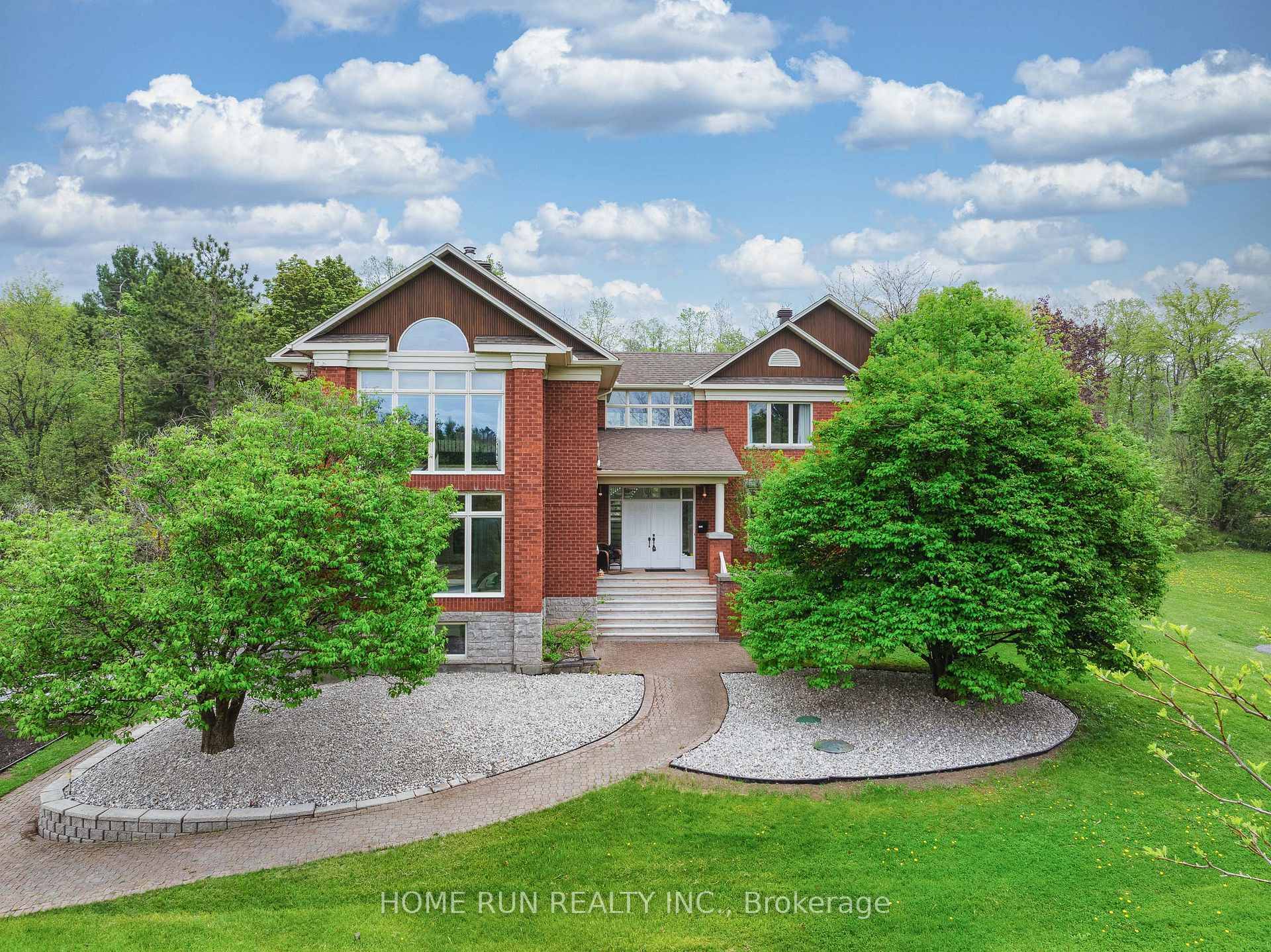This is a one of a kind custom built detached home situated on over 2 acres lot in the prestigious Huntley Ridge community of Carp.
