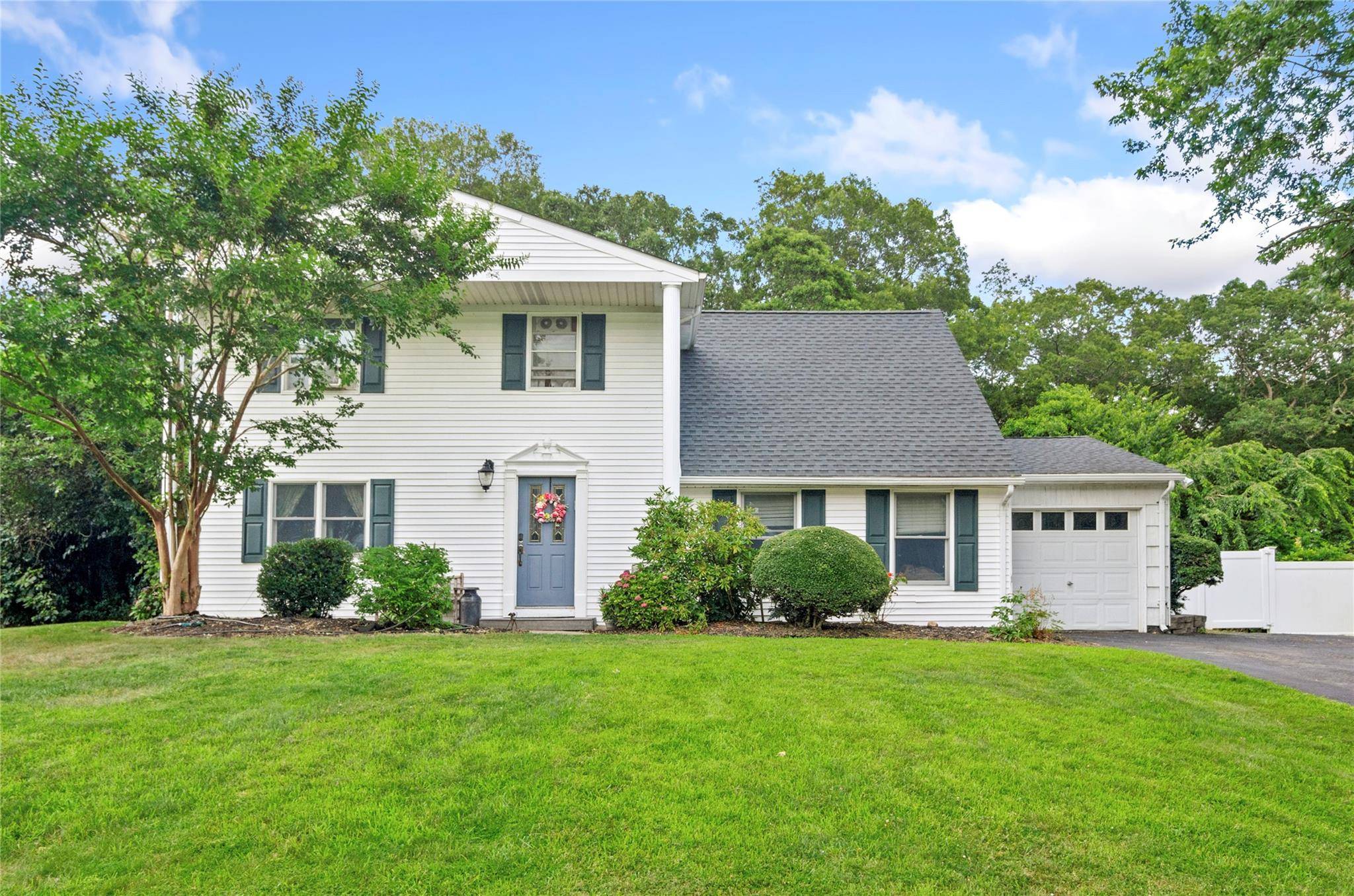 Charming Family Home in a Prestigious Community Discover your dream home in this charming, two story property located in highly sought after Mt Sinai !