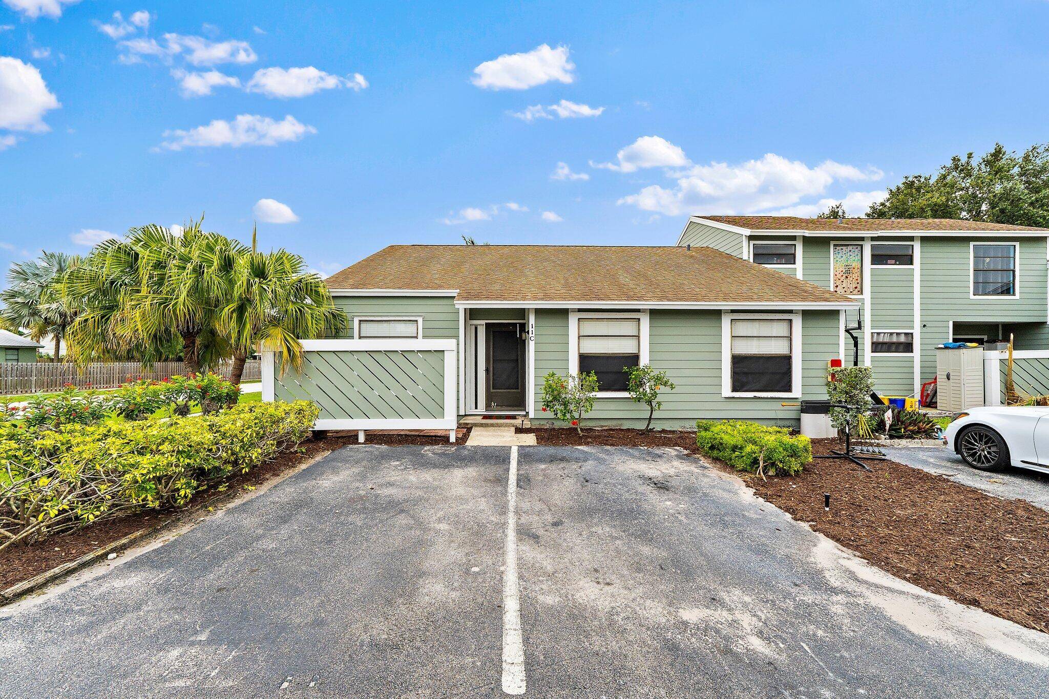 Step into this inviting 3 bedroom, 2 bath single story townhome in the heart of Jupiter Village !