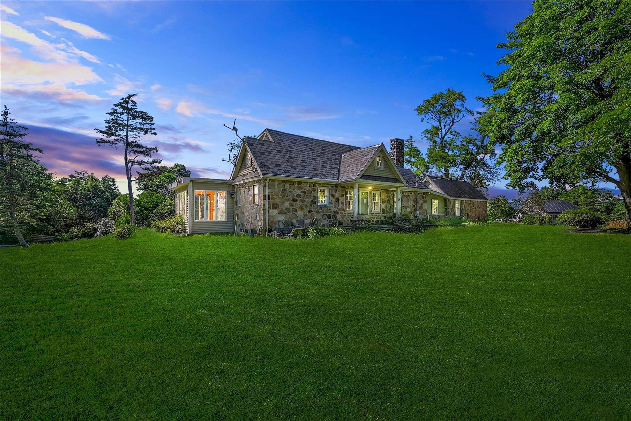 Welcome to this stunning 7 acre Gentleman's Farm, offering beauty, privacy, and tranquility.