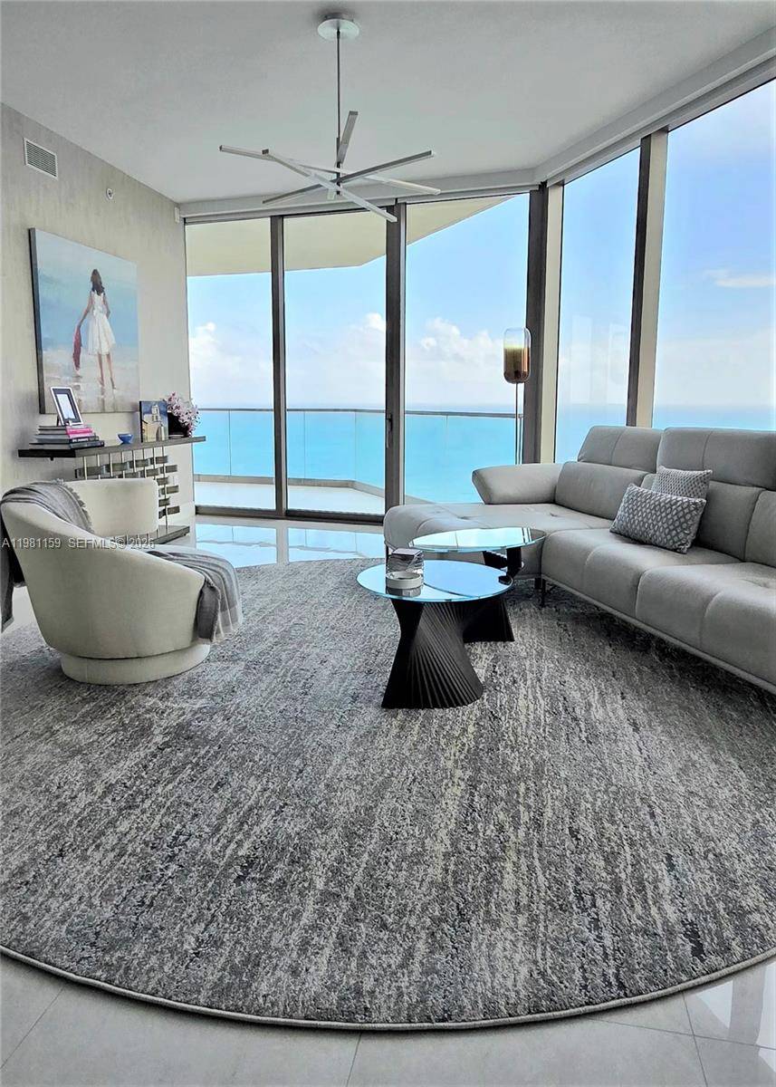 Experience breathtaking oceanfront and city views from this stunning high floor corner residence.