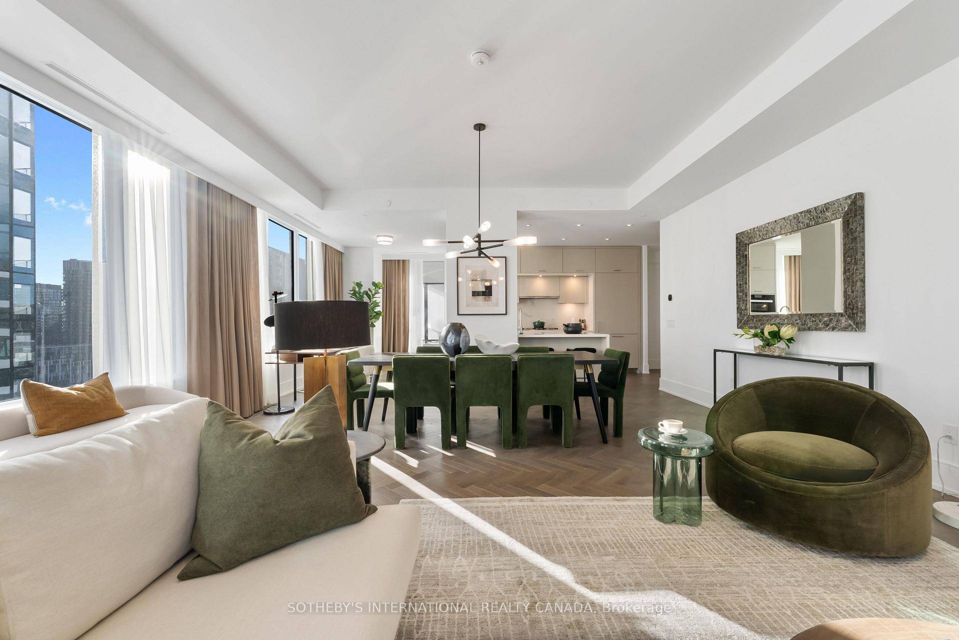 Welcome To Suite 1105. This Luxurious Suite Features A Superior Corner 2 Bedroom Layout With Open Floor Plan, 10 Foot Ceilings, Herringbone Flooring, South East Views And South Facing Balcony.