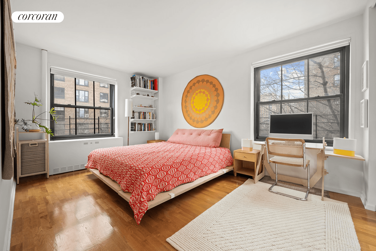 This impeccably renovated two bedroom home floats in the trees along historic Clinton Avenue.