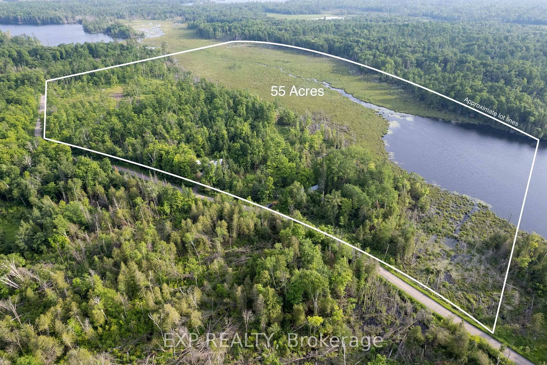 Imagine escaping to your own private paradise on sprawling 55 acres parcel of land where nature greets you at every turn.