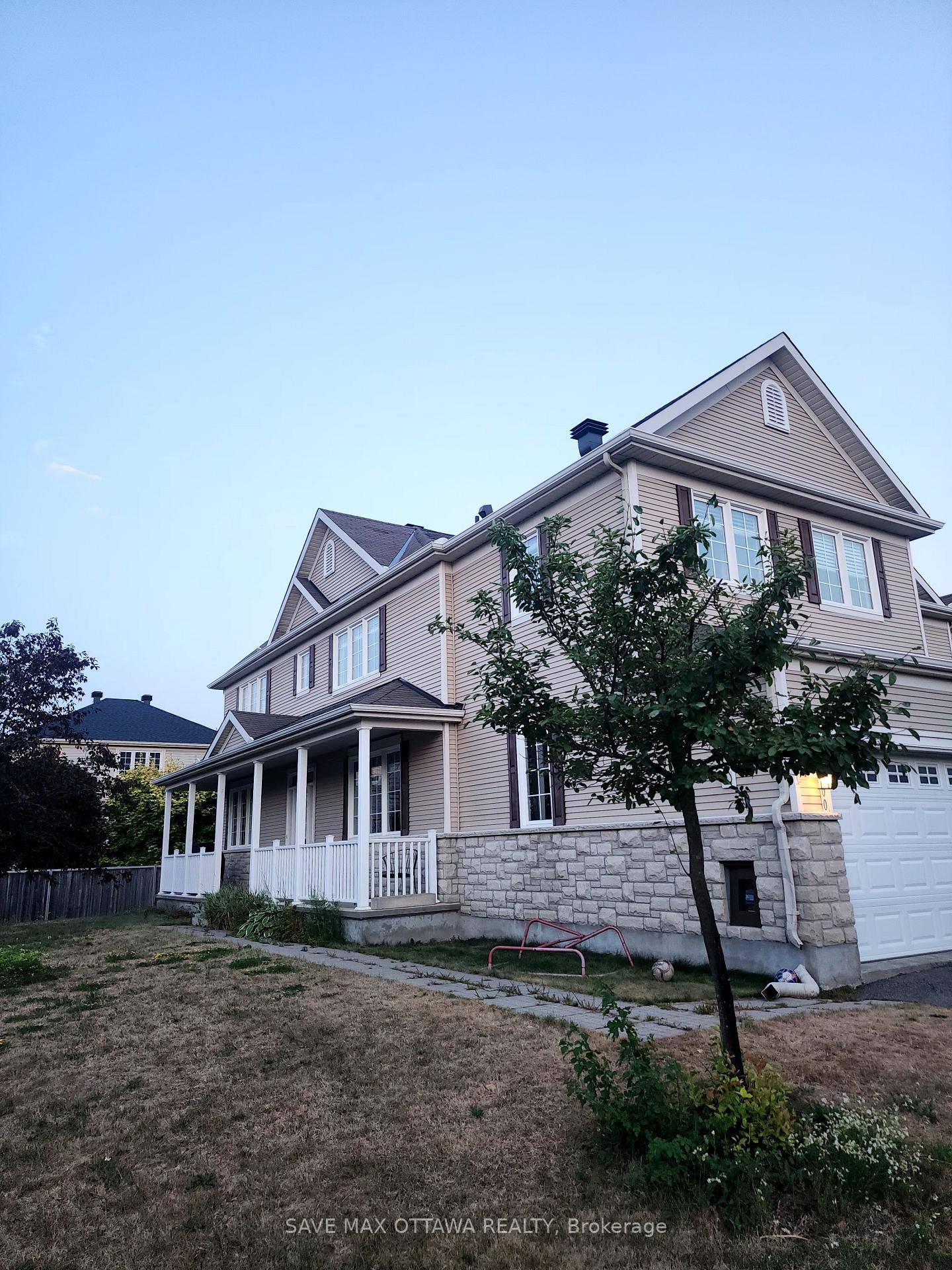 Welcome to this stunning end unit townhome with a 2 car garage, tucked away on a quiet dead end street in the sought after Stonebridge community.