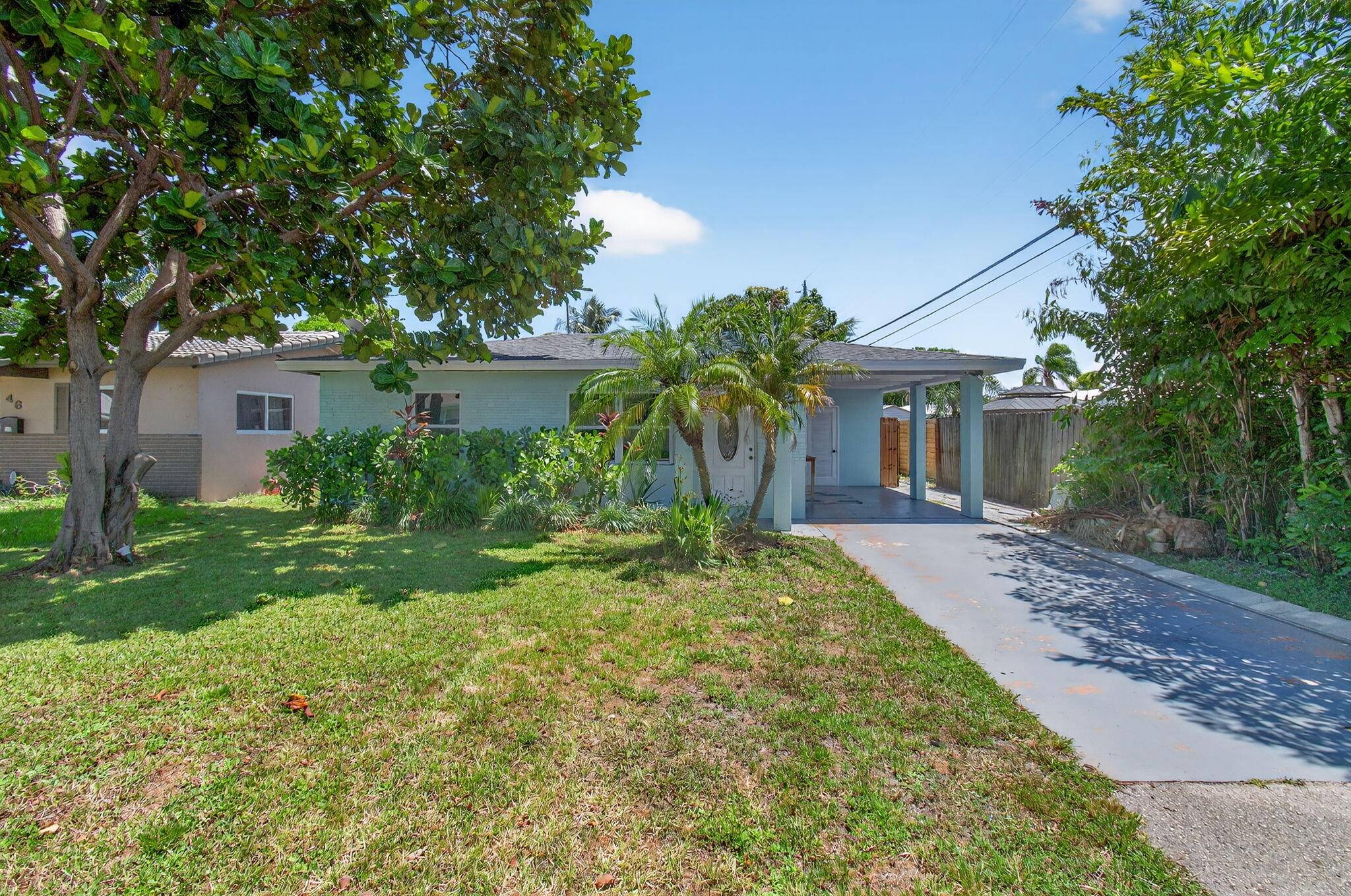 Charming Mid Century Ranch style home located just 10 minutes from Lauderdale by the Sea !