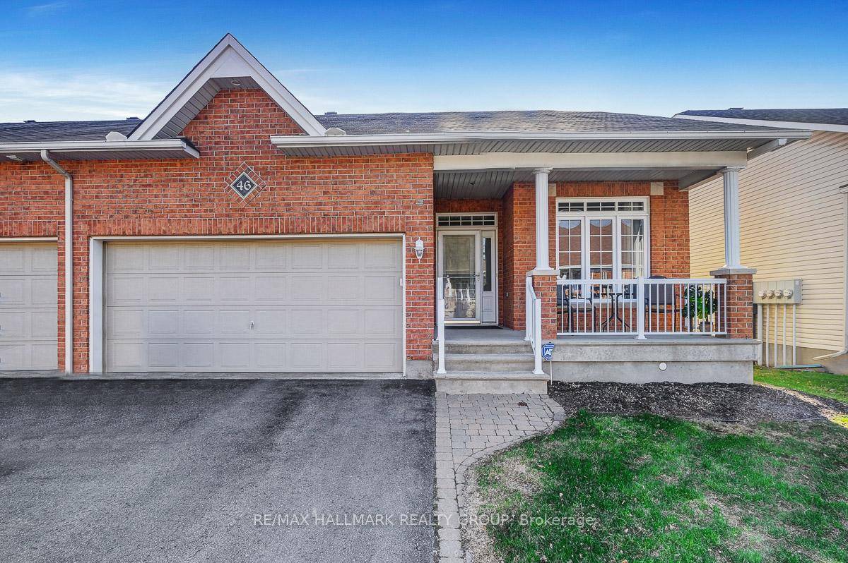 Welcome to this beautifully maintained END unit bungalow, perfectly located on a quiet street.