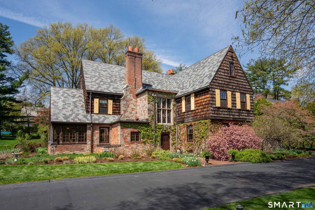 Designed by well known Hartford architect and artist, Merrill Prentice, the home was built in 1928 with all the classic finishes of its era.