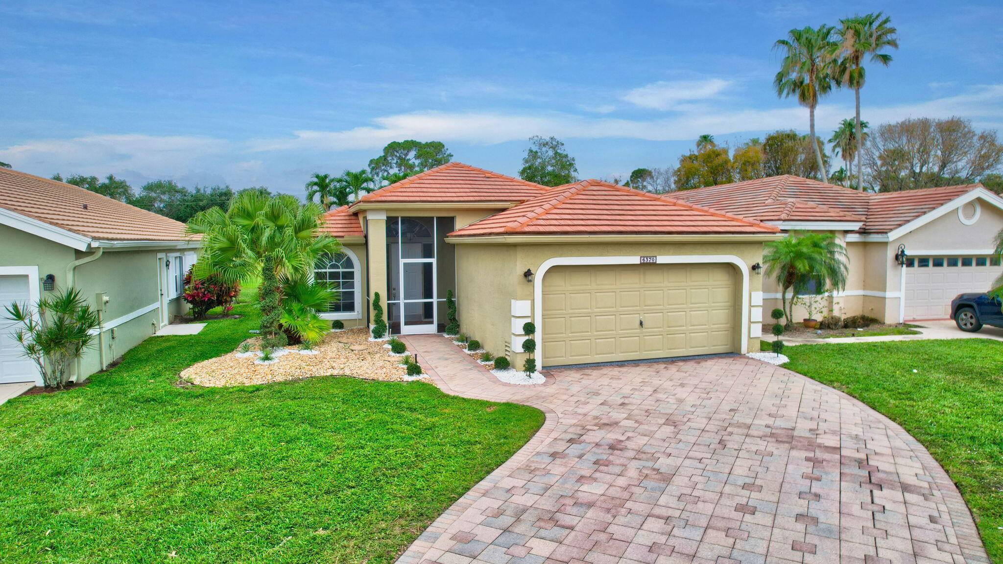 This beautifully remodeled home in the desirable Lacuna Golf Country Club offers a perfect balance of privacy and elegance.