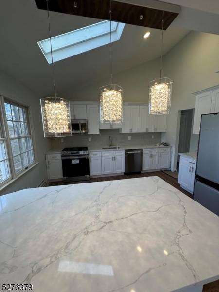 Step into luxury living with this immaculately renovated single family rental nestled on a serene cul de sac in the sought after North Haledon area.