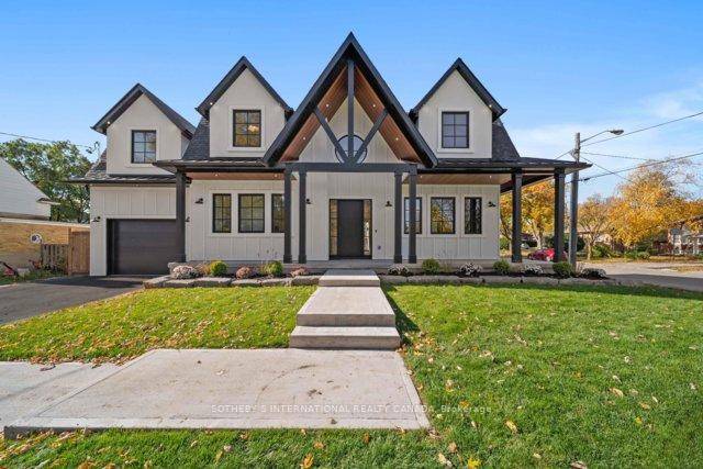 Welcome to 118 Warwood Road a striking modern farmhouse situated on an estate size 73' x 155' lot in Etobicoke's exclusive Glen Park community.