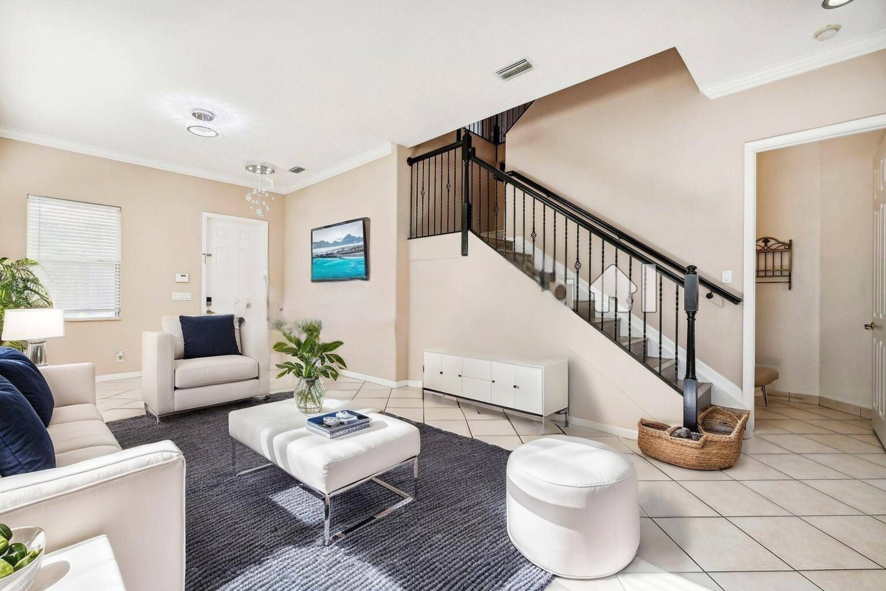 Welcome to 7174 Ivy Crossing Lane, a spacious lakefront rental in the desirable gated community of Palmyra Estates in Boynton Beach.