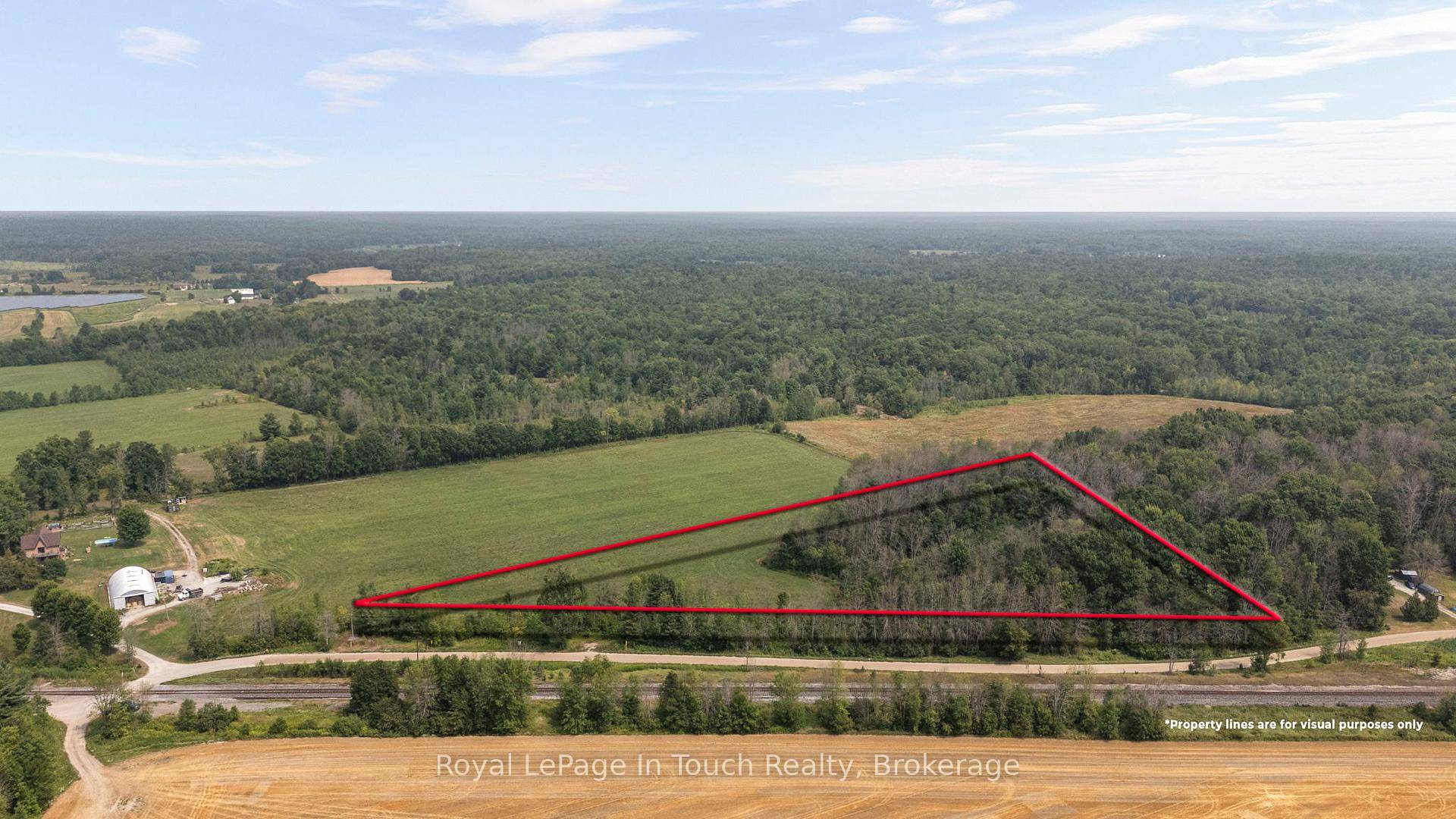 SEVERN TOWNSHIP This 4 acre parcel Offers over 900 feet of Frontage in The Heart of Severn Township ideal for Those Dreaming of Privacy, Space, and a Custom Home Build.