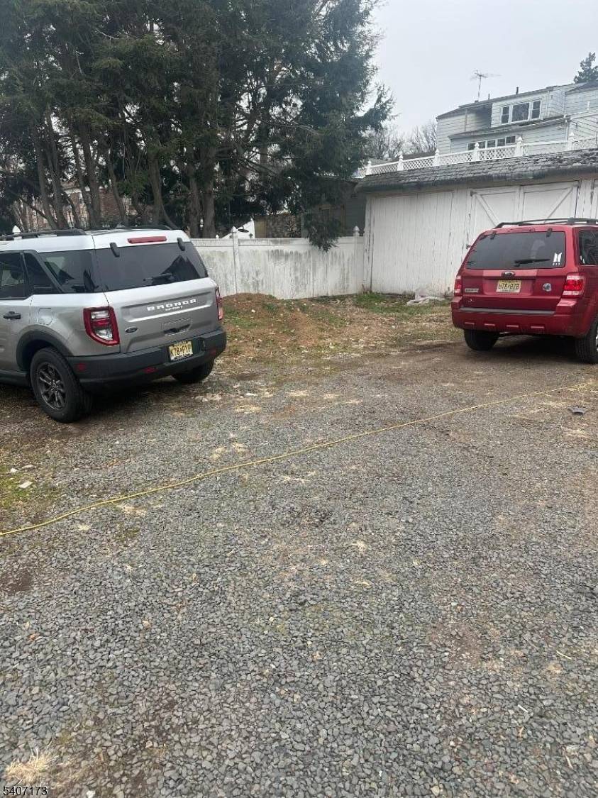 Exceptional investment opportunity featuring a three family, income producing property situated on one large lot.