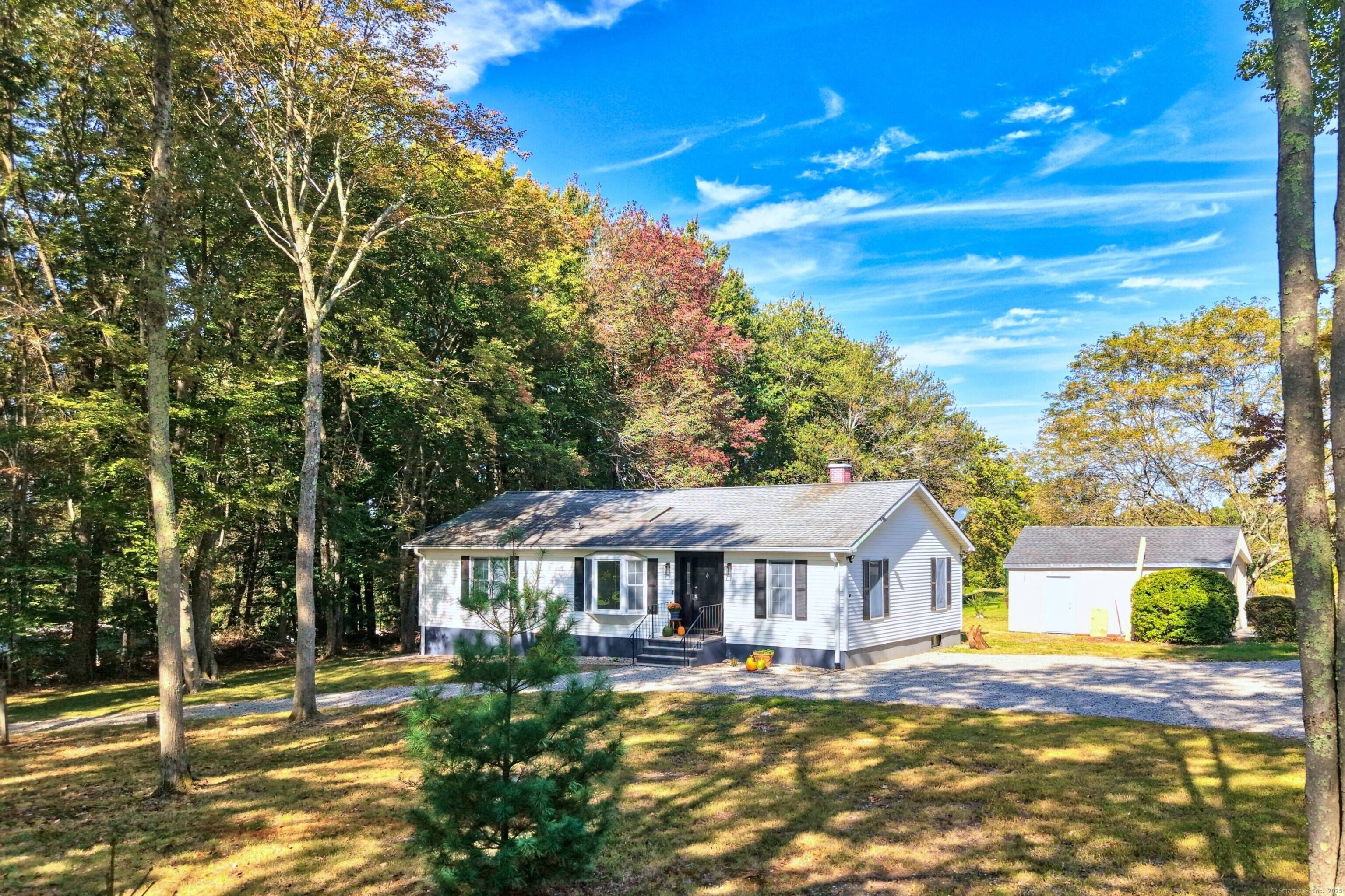 Step into this stunning ranch featuring a unique horseshoe driveway and ample space to subdivide the lot.