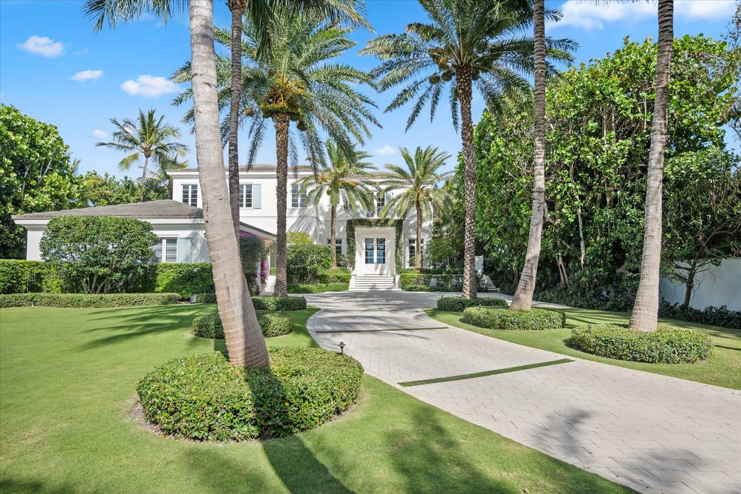 Gated Oceanfront Estate completely rebuilt in 2017 is set high above the dune on one of Gulf Stream's most desirable beaches.