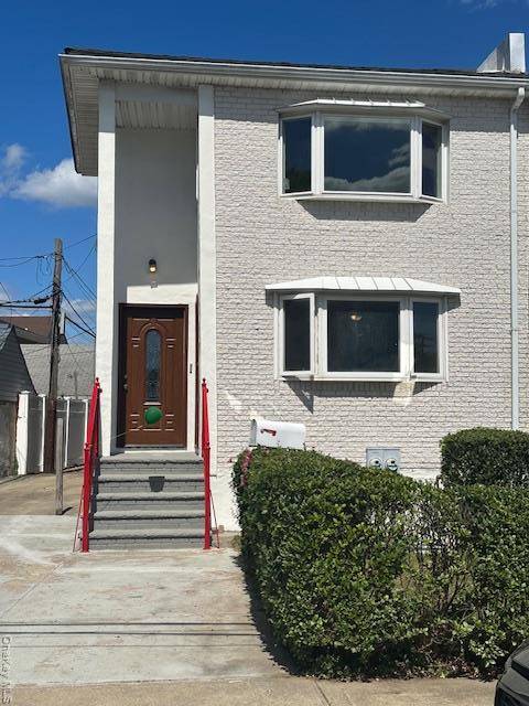 Beautiful 2 Family home located in the heart of Bellerose.