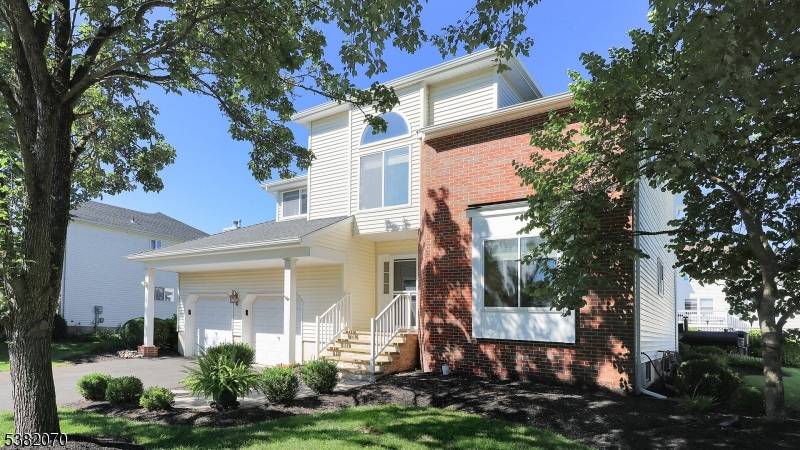 Welcome to this stunning Colonial featuring 3 spacious bedrooms and 2.