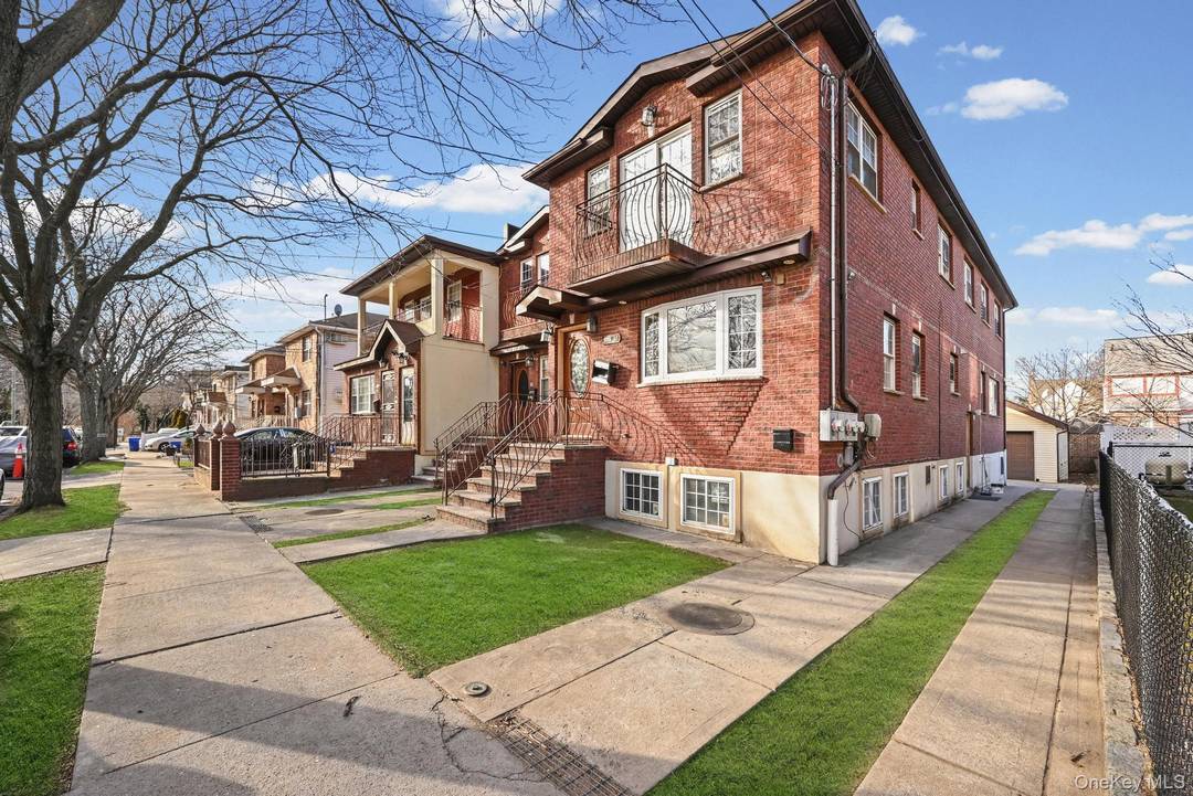 Newly Renovated Oversized 2 Family Brick House in Springfield Gardens, featuring a duplex 3Bed, 1Bath, Living, Dining, Kitchen unit on the front, a duplex 2Bed, 1Bath, Living, Dining, Kitchen unit ...