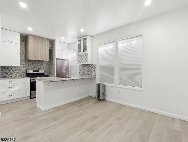 Renovated 4BR 2BA Home this beautifully updated property features a modern open layout, brand new kitchen baths, new flooring, and abundant natural light.