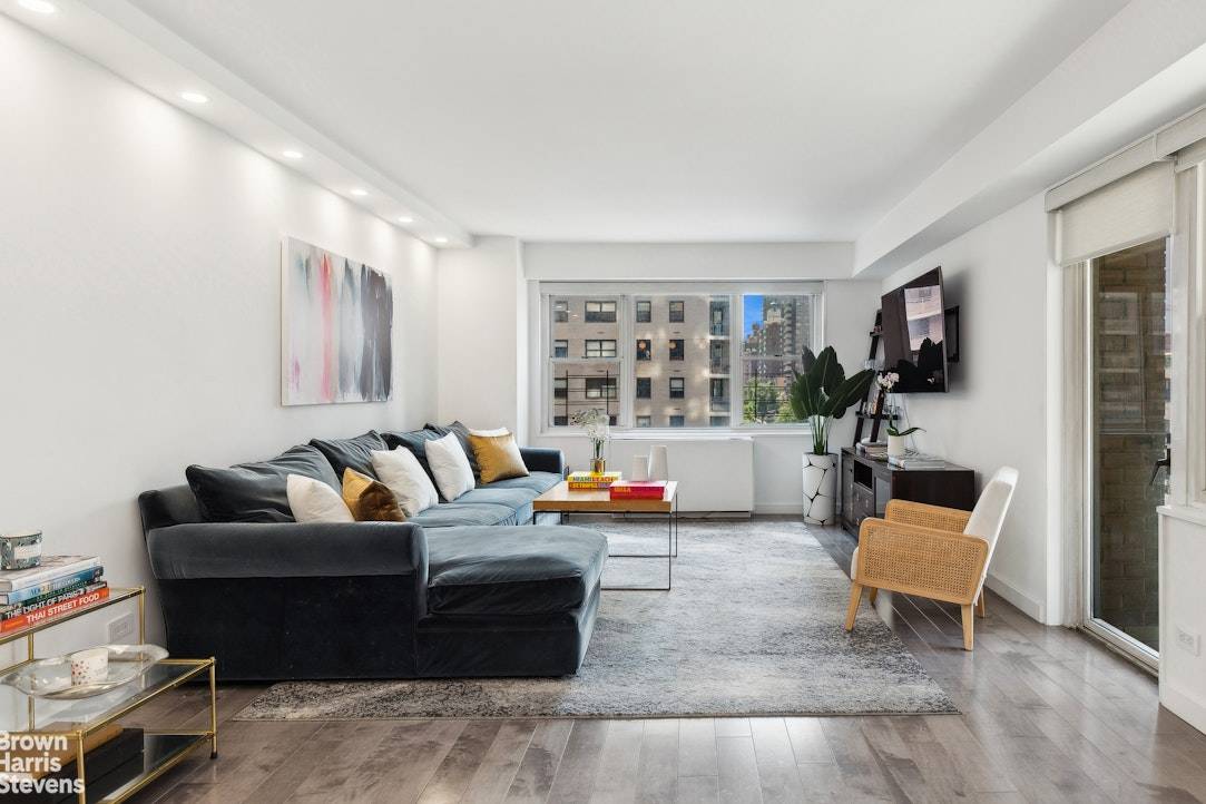 A palatial corner co op with one balcony, one kitchen, this dazzling 3 bedroom, 2.