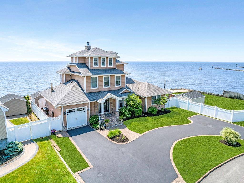 Welcome to a rare slice of waterfront paradise on the Great South Bay, where the beach and the water are your closest neighbors and the views stretch endlessly in every ...