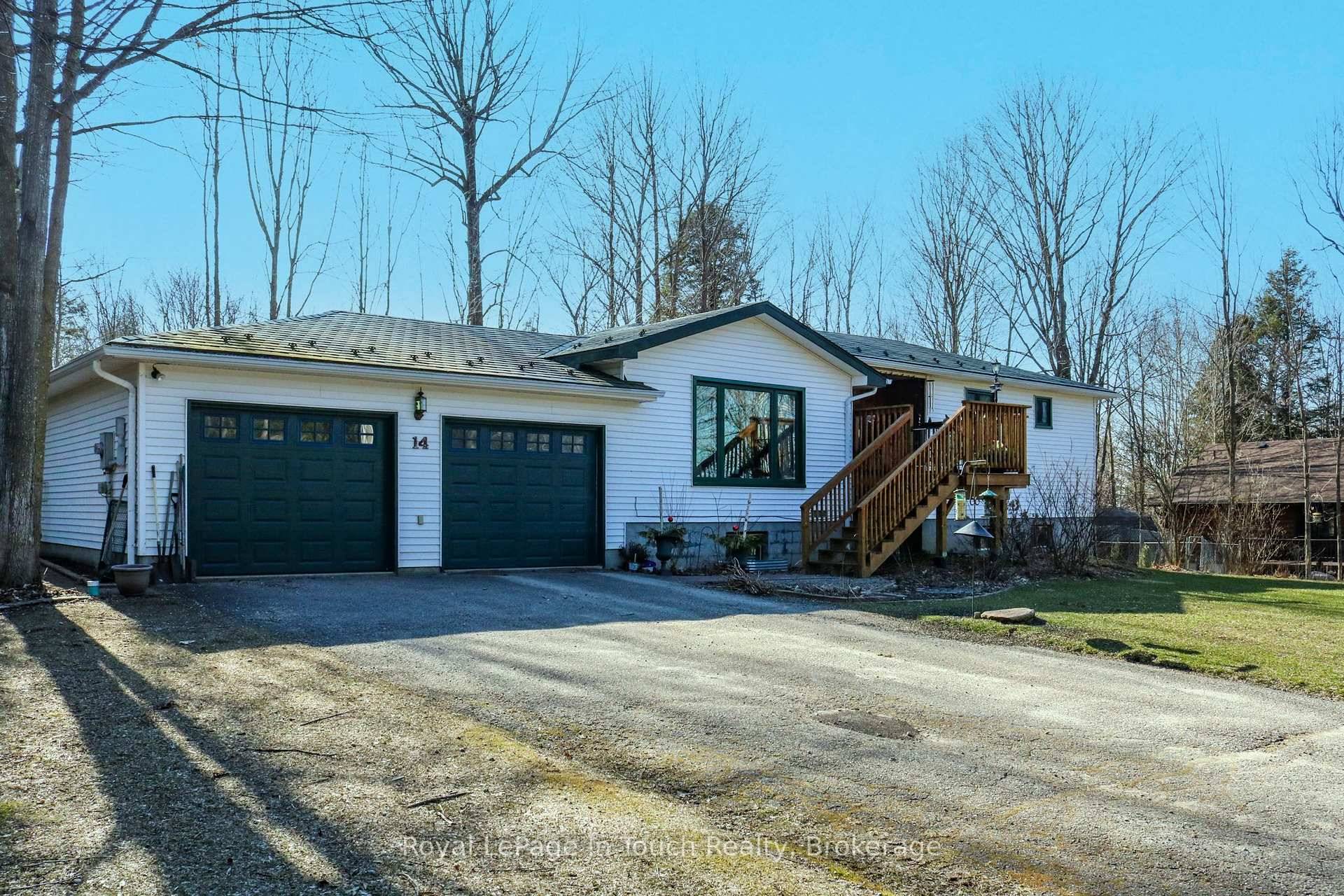 Welcome to 14 Seneca Crescent, where privacy, nature, and quality craftsmanship come together in this beautifully maintained raised bungalow just moments from the shores of Georgian Bay.