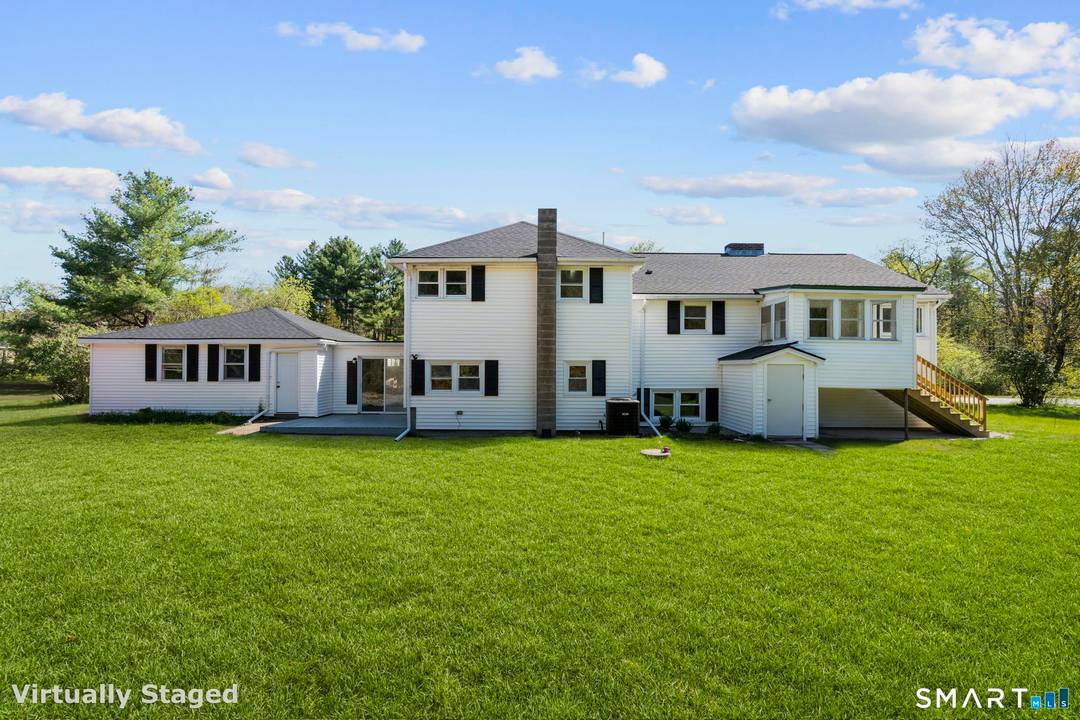 Welcome to 26 Quaddick Town Farm Road, a stunningly revitalized residence where modern luxury meets tranquil country living.